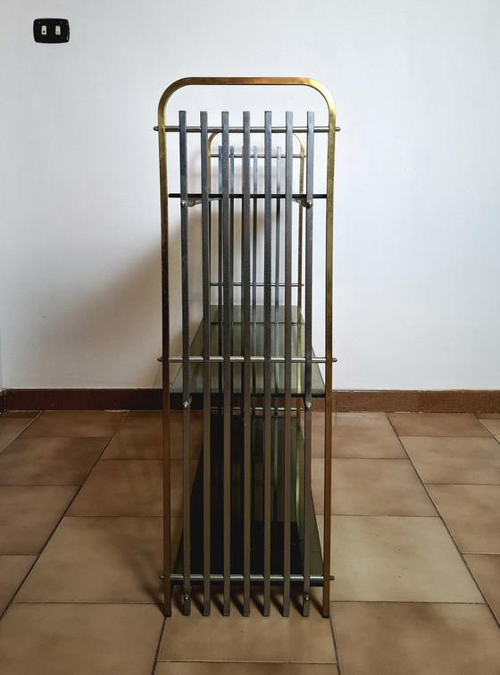 Image 1 of Italian shelf in chromed metal, brass and glass. 1970s.