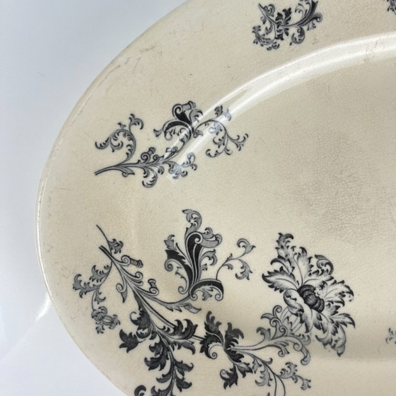 Image 1 of Grand plat ovale terre de fer, modele "Damas" par Sarreguemines, fin XIXe, gris-noir