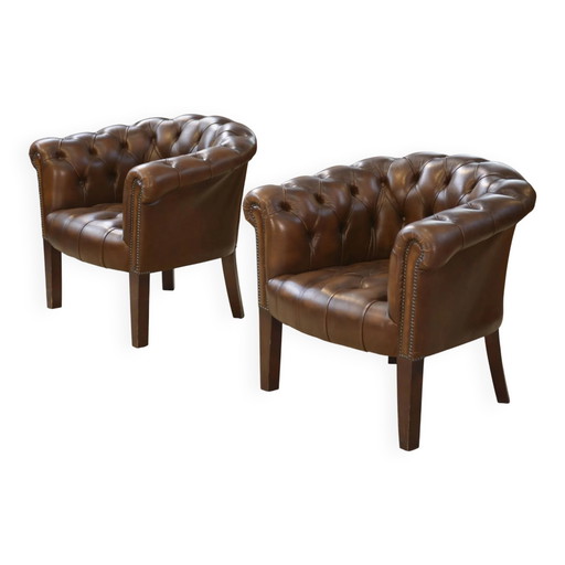 Pair of upholstered leather Club armchairs