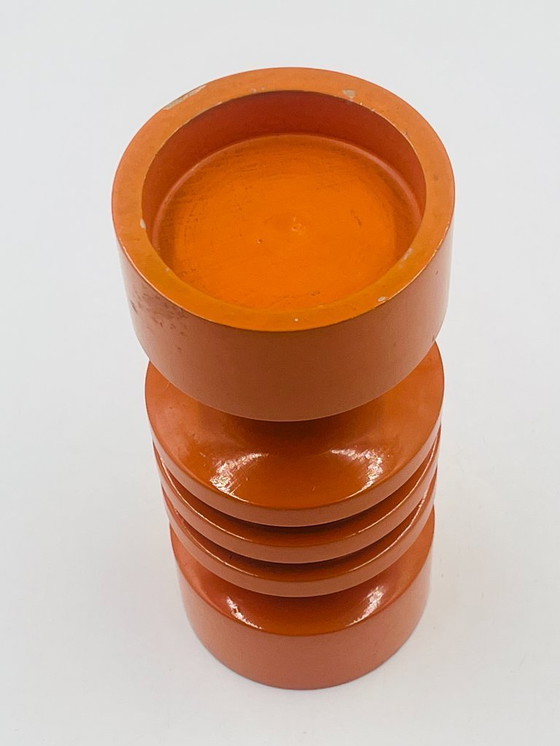 Image 1 of Oranje houten kandelaar uit de jaren zeventig