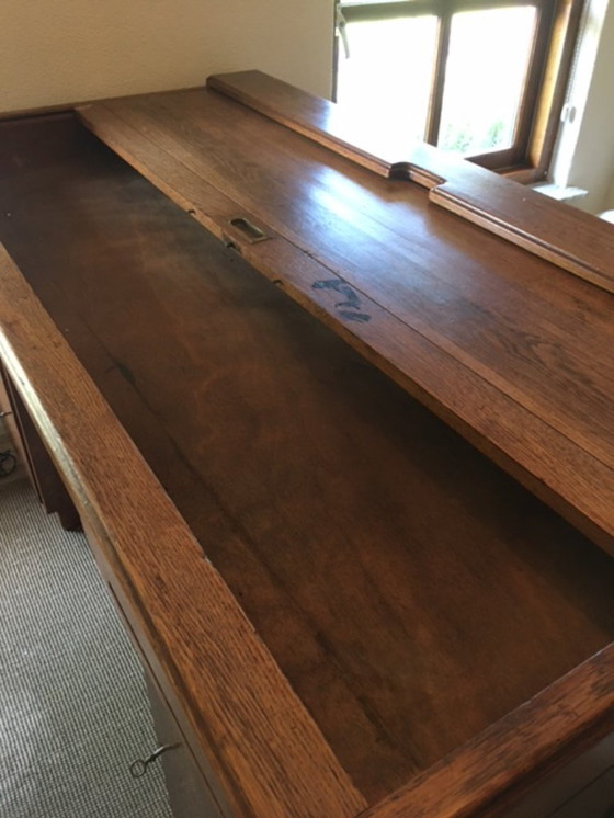 Image 1 of Eiken bureau met in/uitschuifbaar bovenblad