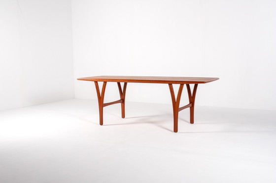 Image 1 of Grote Deense teakhouten salontafel, jaren 60