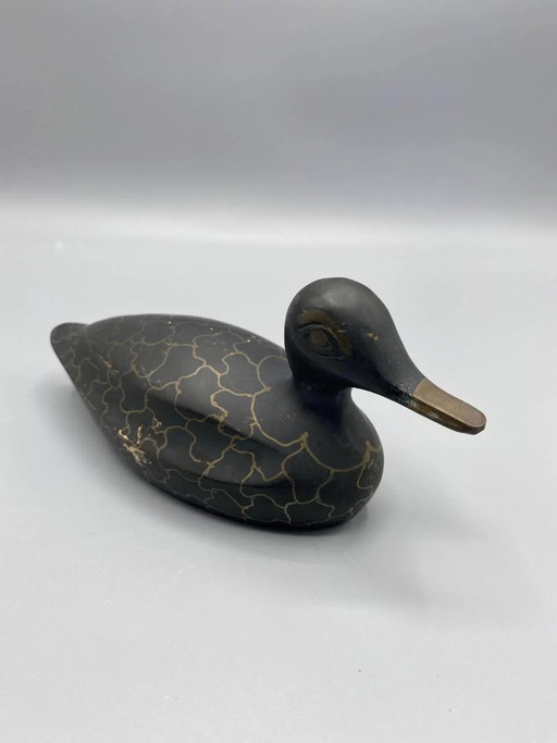 Antica scultura stilizzata di anatra in metallo patinato nero e oro. – decoratieve objecten