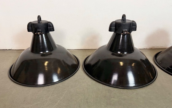Image 1 of Set of 4 Industrial Black Enamel Factory Lamps with Cast Iron Top, 1950s