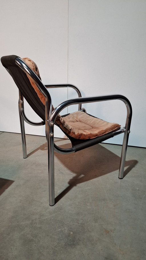 Chrome tubular frame armchairs