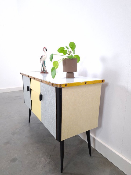 Image 1 of 1950s light blue-yellow cabinet with Formica and slanted legs