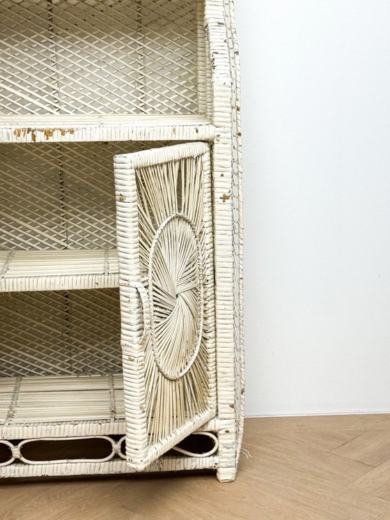 Image 1 of Vintage rattan wicker arch cabinet with sunflower motif