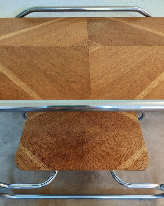 Image 1 of Mesa auxiliar Art Decó / Bauhaus - estructura tubular y tablero chapado