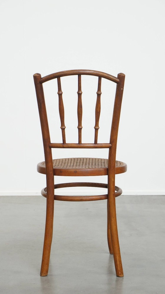 Image 1 of Vintage bistro stoel in de stijl van Thonet met een rieten zitting