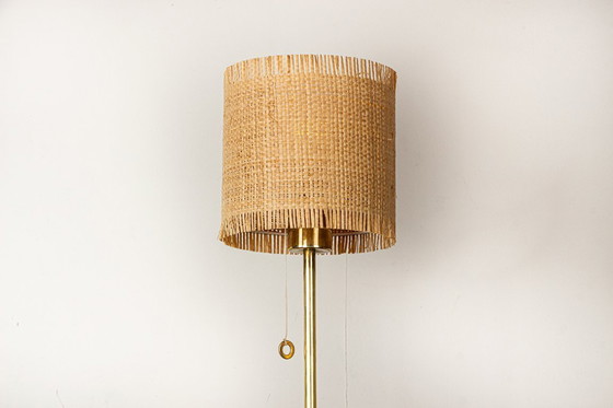 Image 1 of Lampadaire Suédois en Laiton, pied en fonte, modèle G 019 par Bergboms 1960.