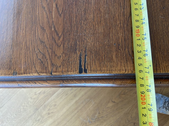 Image 1 of Mesa de castillo antigua con 6 sillas y asiento de mimbre.