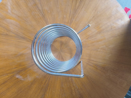 Vintage newspaper holder spiral chrome