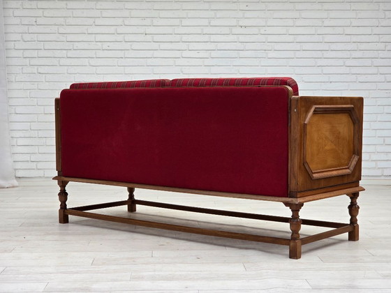 Image 1 of 1950s, Danish 2 seater drop arm sofa, original striped red furniture wool, oak wood.