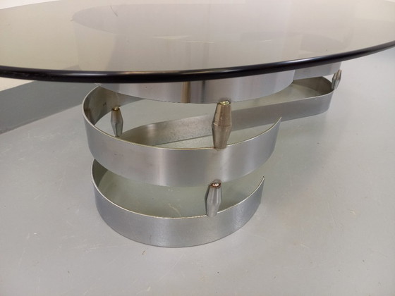 Image 1 of Vintage ovale salontafel van rookglas en verchroomd metaal uit de jaren 70.