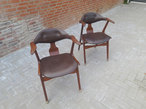 Two louis van Teeffelen cow horn chairs