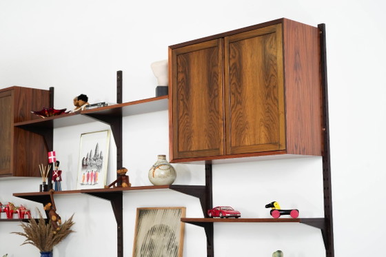 Modulaire stellingen van palissanderfineer van Poul Cadovius, Denemarken, jaren 70. – Wandkast, Mdf (photo 8 of 27)