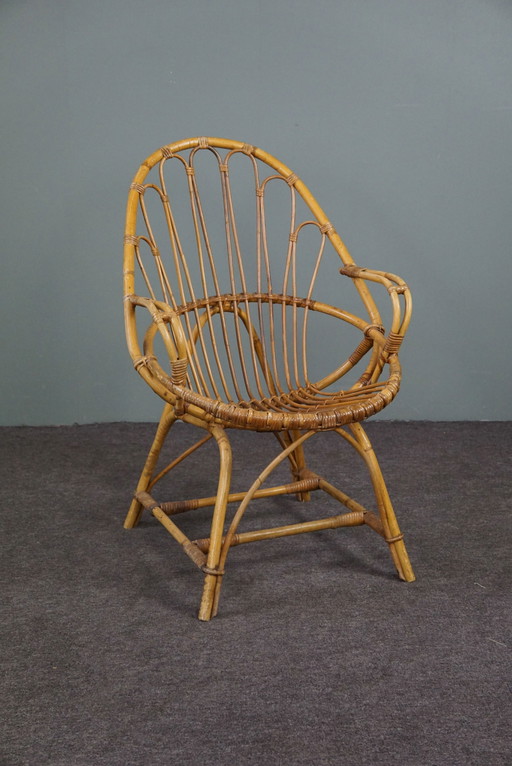 Poltrona in rattan con braccioli, design olandese, 1950