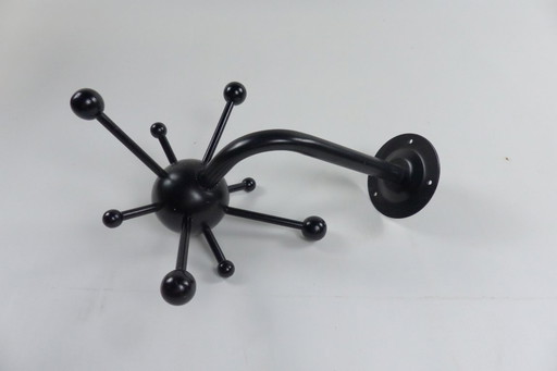 Coat rack in the taste of Osvaldo Borsani.