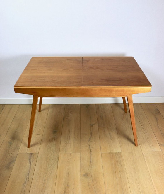 Image 1 of Extendable wooden table designed by Jiri Jiroutek