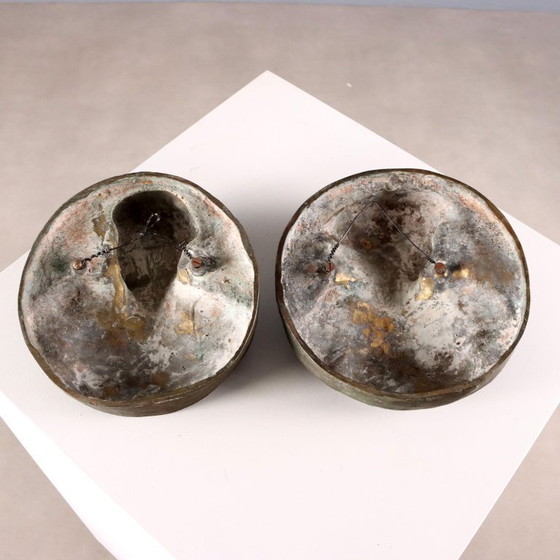 Image 1 of Een paar bronzen panelen, gesigneerd door G. Botta.