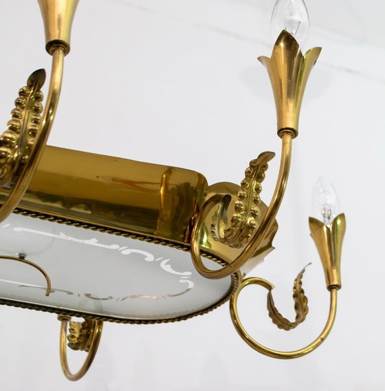 Image 1 of Dopo Pietro Chiesa Candeliere italiano a 12 luci in ottone del Medioevo Fontana Arte