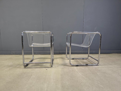 Paire de fauteuils en plexiglas et tubes chromés, années 1970