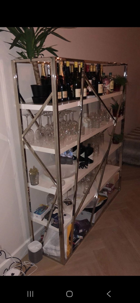 Image 1 of Stylish cabinet from Beliani in white with stainless steel frame