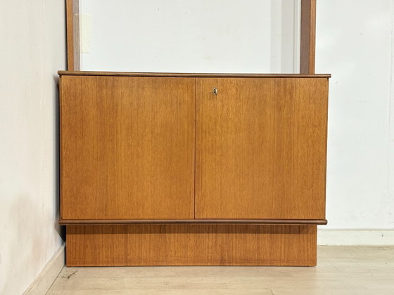 Modular mid-century wall shelf by interna-Peter Pedrides / Teak shelving system 1960s – Shelving unit, Wood (photo 9 of 27)