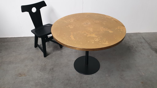 Brass patinated table round wabi sabi cast iron base Pedrali