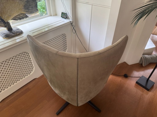 Leolux Caruzzo draaifauteuil plus leer met hocker