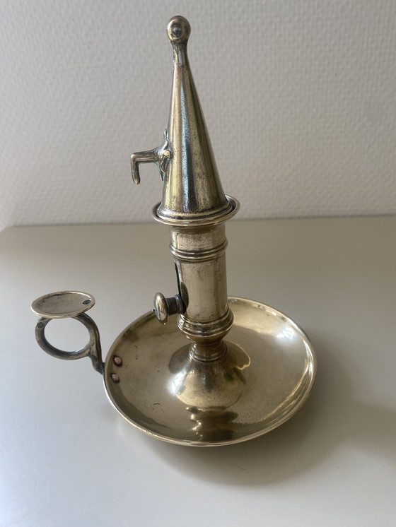 Image 1 of Antique candlestick in solid bronze
