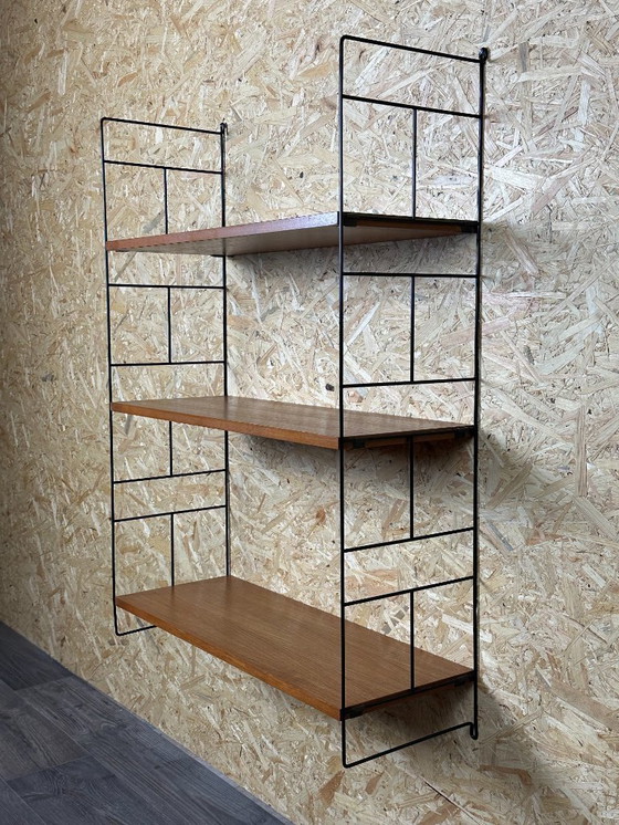 Image 1 of Anni '60-'70 scaffale in teak Scaffale a muro WHB Germania Scaffale a corda Design danese