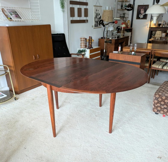 Vintage rosewood round extendable dining table (photo 5 of 11)