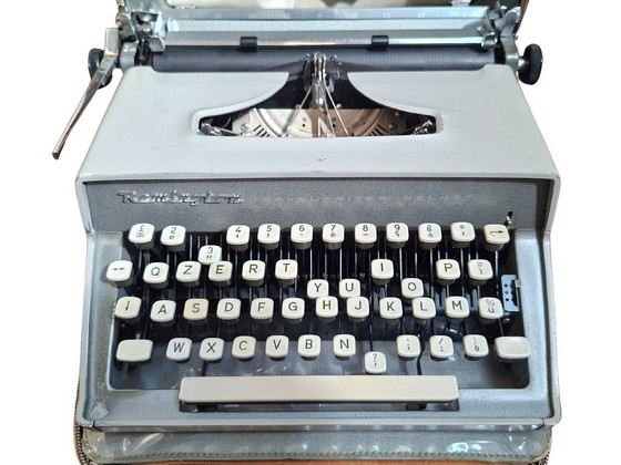 Image 1 of Remington Travel-Riter Deluxe (années 1960) + Documentation originale