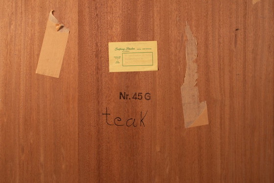 Image 1 of Deense teakhouten boekenkast uit het midden van de 20e eeuw met schuifdeuren – Sejling Skabe, jaren 60