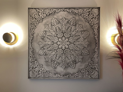 Relieve de pared de metal