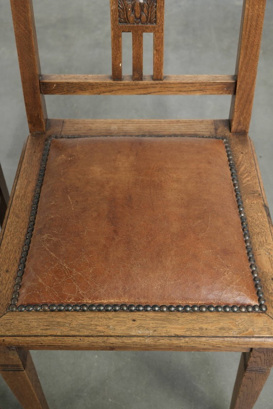 Image 1 of Ensemble de 4 chaises de salle à manger anciennes en chêne de style Art nouveau, recouvertes de peau de mouton.