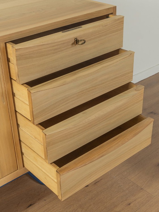 Image 1 of Dressoir uit 1950 met blauwe bauhaus poten