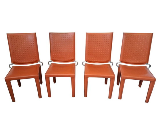 Image 1 of Set van 4 designstoelen in oranje leer en vintage ijzer.