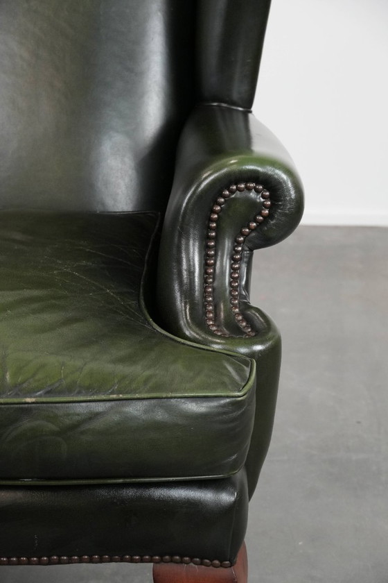 Image 1 of Fauteuil Chesterfield classique en cuir de vachette lisse de couleur vert foncé