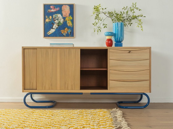 Image 1 of Dressoir uit 1950 met blauwe bauhaus poten