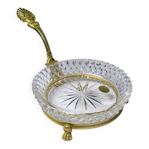 Vide-poche de cristal de Sèvres, creado por L. Seiler, con montura de oro antiguo.