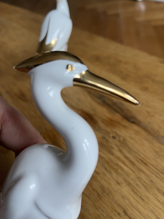 Image 1 of 2 porseleinen vogels met 24 karaat goud