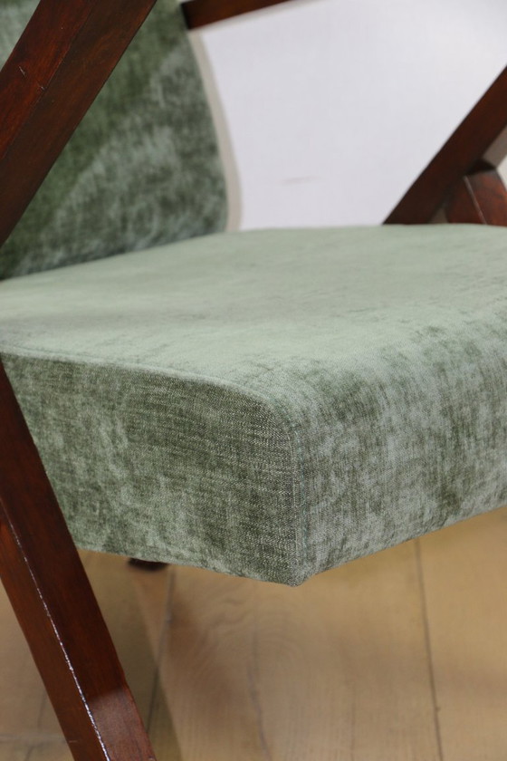 Image 1 of Vintage loft-fauteuil in olijfgroen, net als een spijkerbroek.