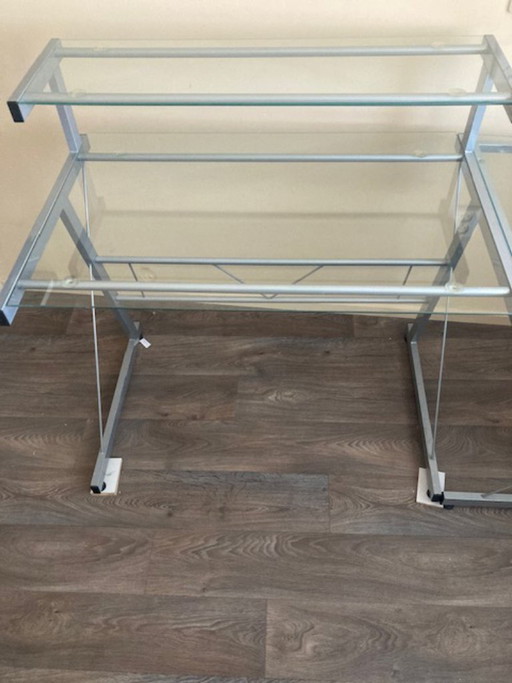 Escritorio esquinero modular de cristal: un estilo que ahorra espacio.