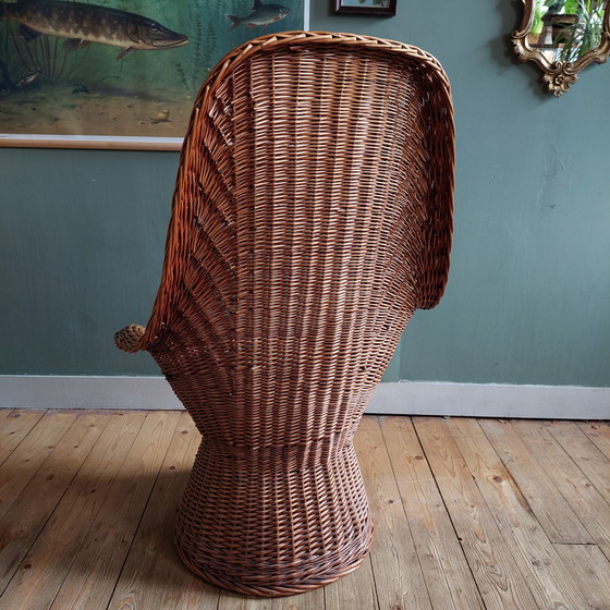 Image 1 of Vintage rieten of rotan stoel met Vintage kussen