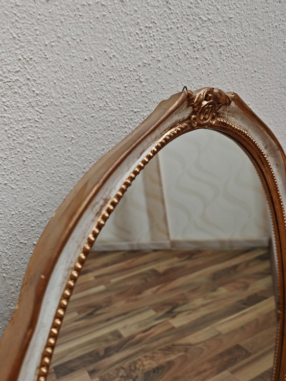 Image 1 of Oval mirror with wooden frame, white, gold from an estate