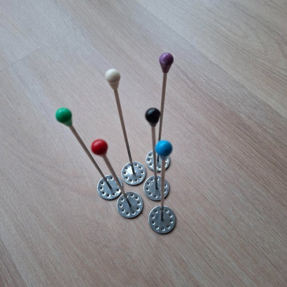 Image 1 of 1950s tonic tampers with rubber caps