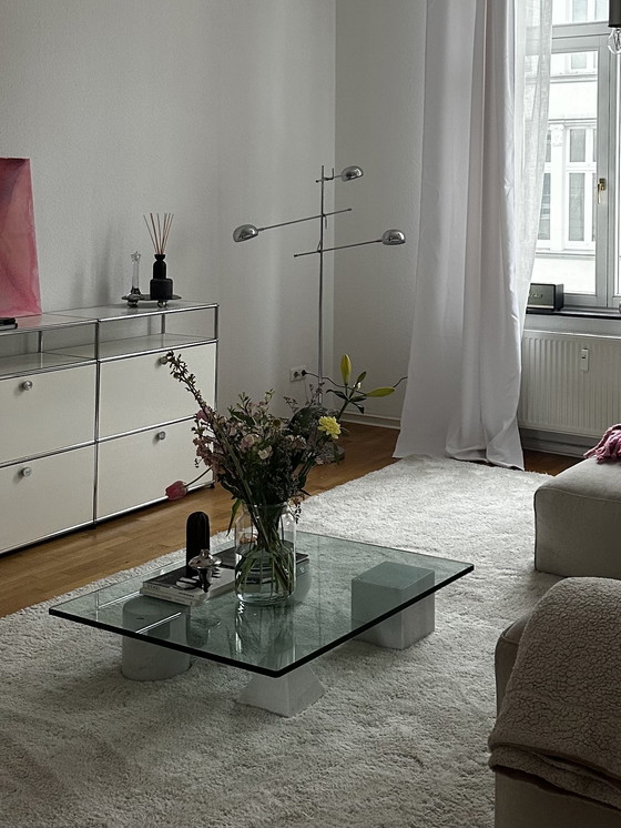 Image 1 of Thick glass top with marble figure feet