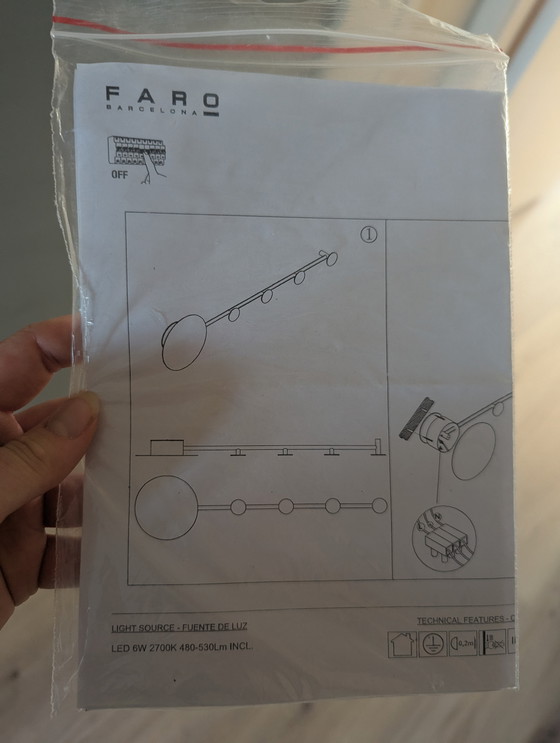 Image 1 of Faro Barcelona - Appendiabiti in ghisa con luce